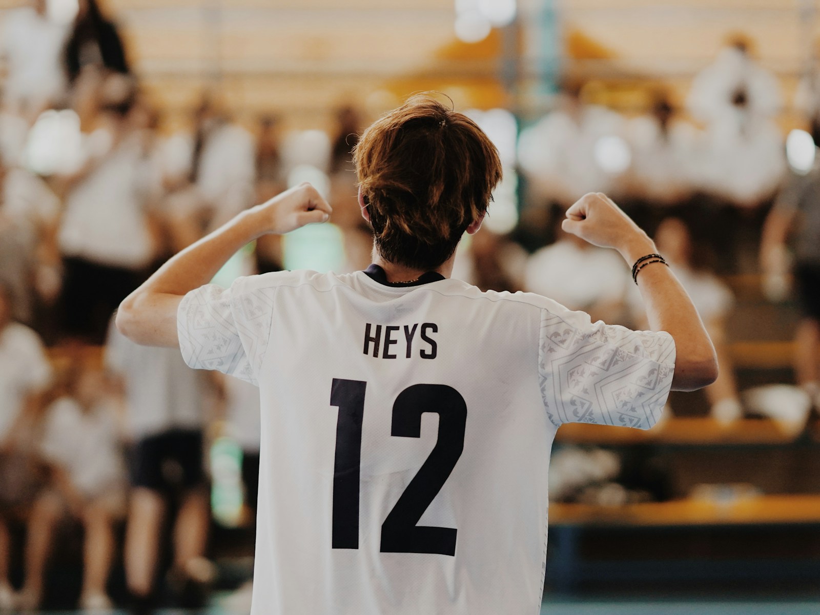 woman in white and black crew neck t-shirt